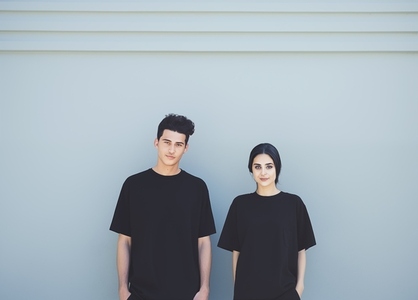 A couple wearing black tshirt