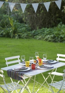 Table laid for lunch in the garden