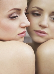 Close up of Woman Face and Mirror Image