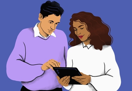 Couple using digital tablet together on blue background