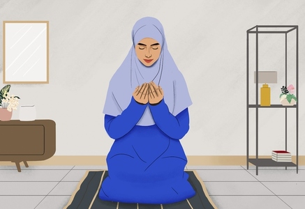 Muslim woman in hijab praying on mat at home