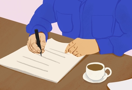 Man filling out paperwork at table with coffee