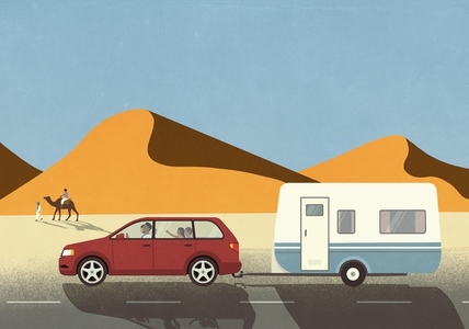 Family in car on vacation pulling camper trailer along sand dunes in desert