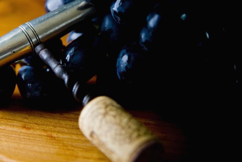 Black Wine Grapes and Corkscrew
