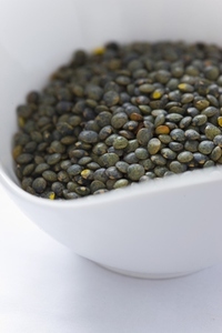Green Puy Lentils in white bowl