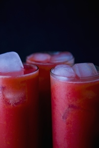 Three Glasses of Raspberry Juice with Ice