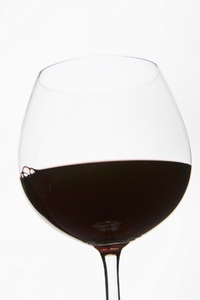 Glass of Red Wine on white background