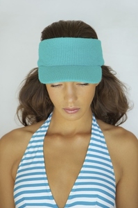 Young Woman Wearing Blue Visor Hat