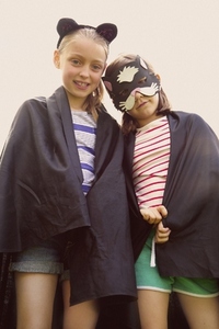 Young Girls Wearing Cape and Mask