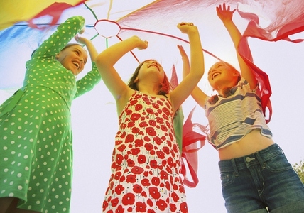 Children Playing under Parachute