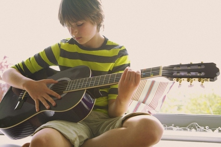 Boy Playing Guitar