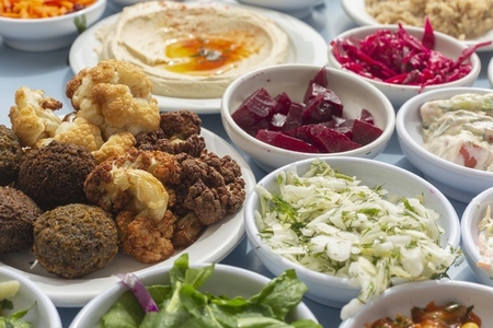 Still life falafel hummus and Israeli cuisine side dishes