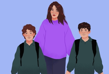 Mother walking schoolboy sons with backpacks to school