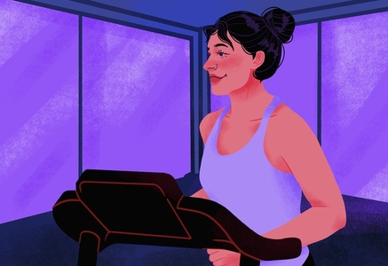 Smiling woman exercising on treadmill in gym