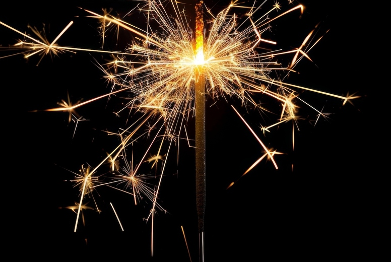 Sparkler on a black background.