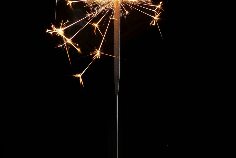 Sparkler on a black background.