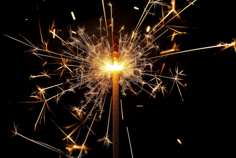 Sparkler on a black background.