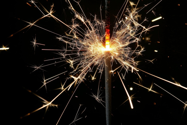 Sparkler on a black background.