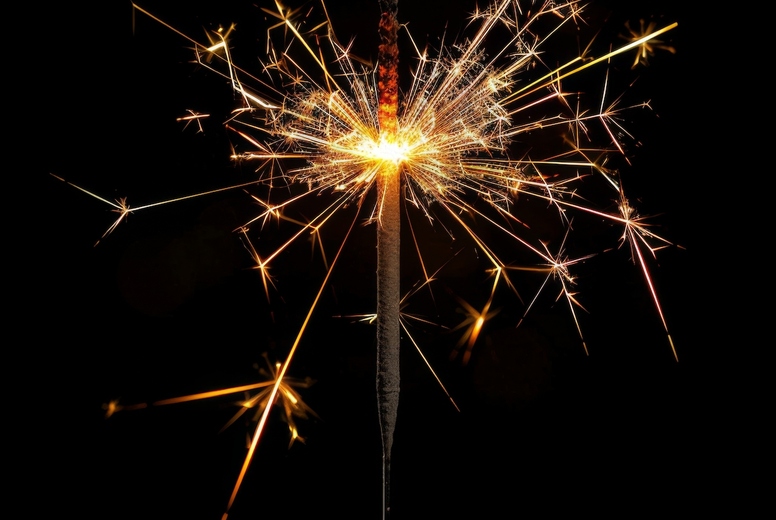 Sparkler on a black background.