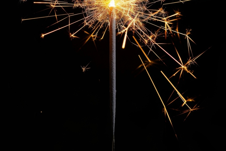 Sparkler on a black background.