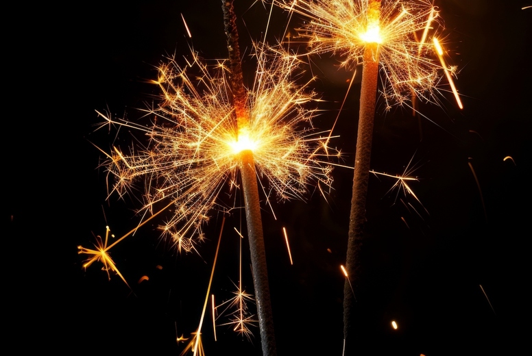 Sparklers on a black background.