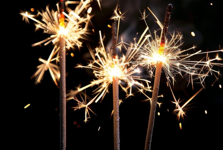 Sparklers on a black background.