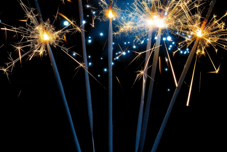 Sparklers on a black background.