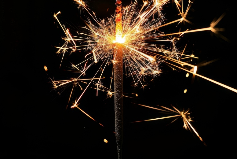 Sparkler on a black background.