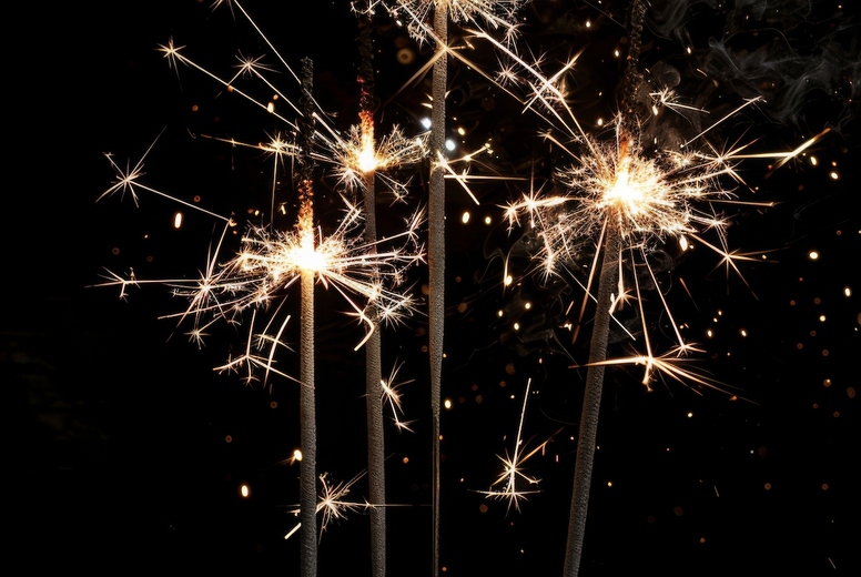 Sparkler on a black background.