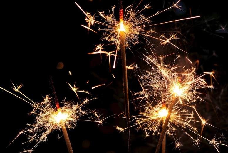 Sparkler on a black background.