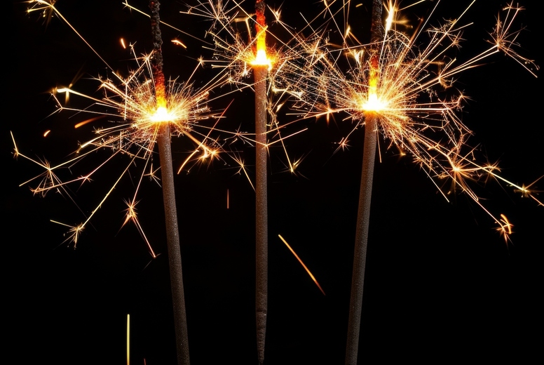 Sparkler on a black background.