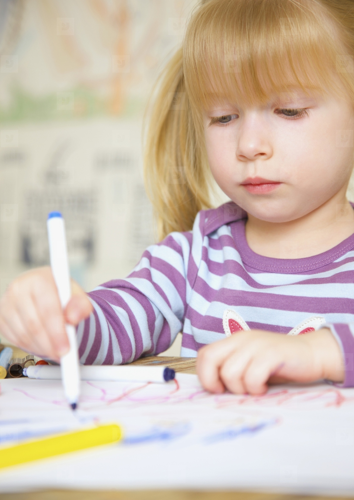 Girl drawing and coloring