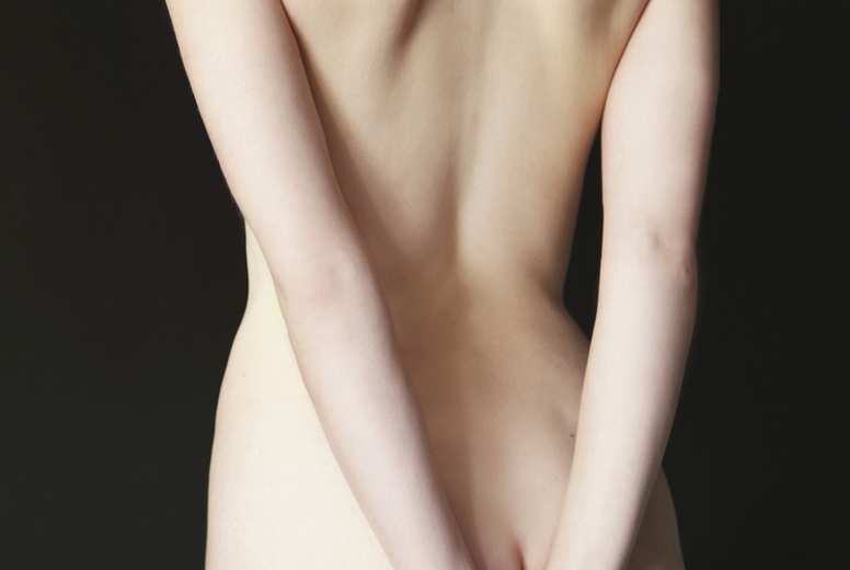 Back view of a nude woman