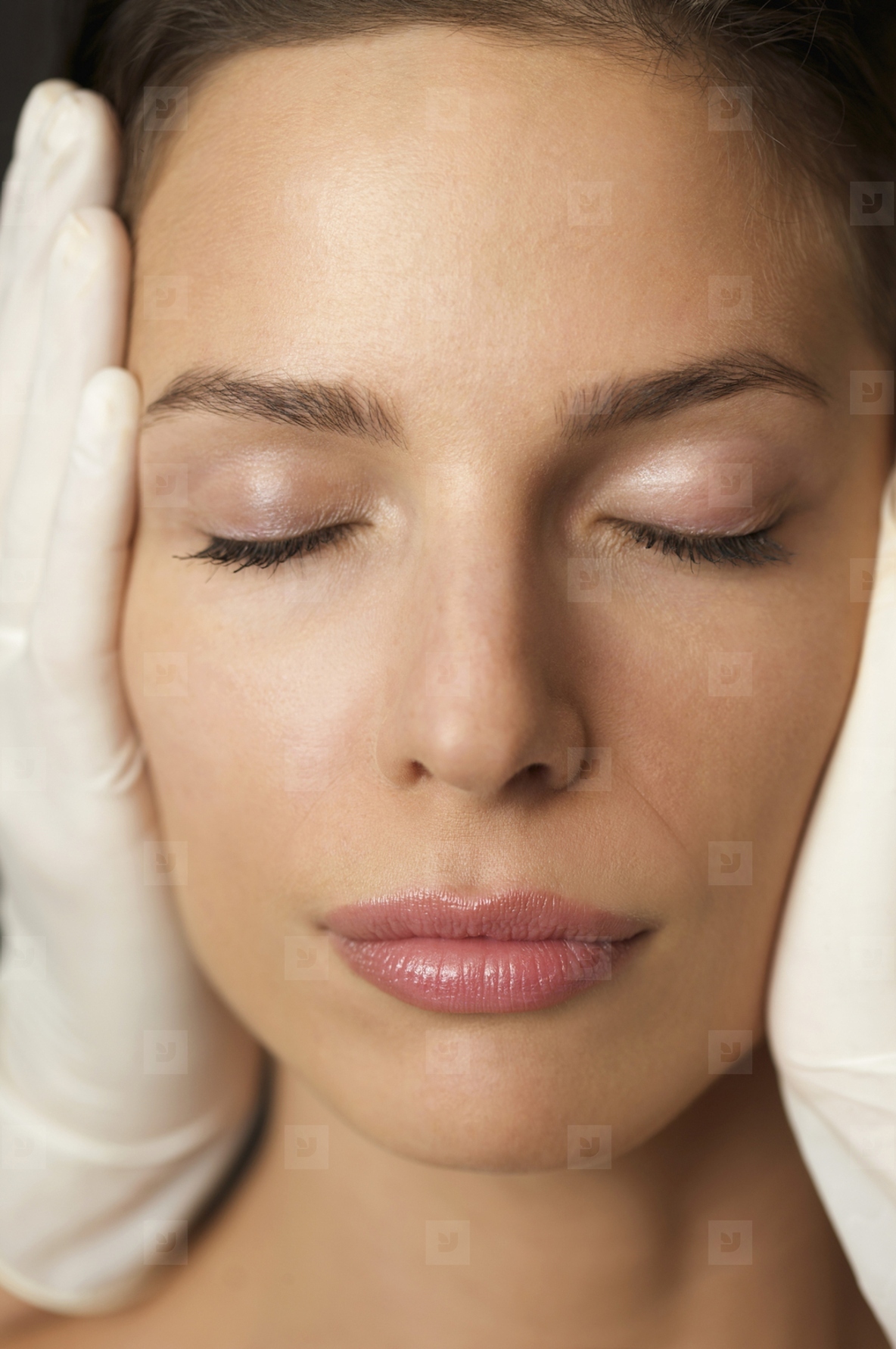 Close up of a womans face during a cosmetic examination