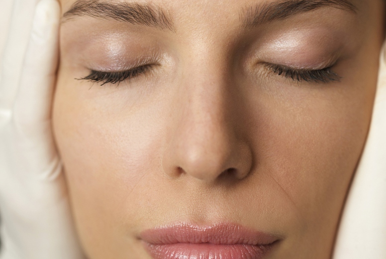 Close up of a womans face during a cosmetic examination