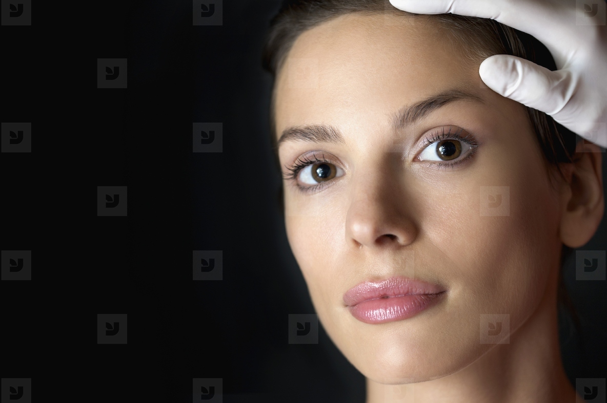 Close up of a womans face during a cosmetic examination