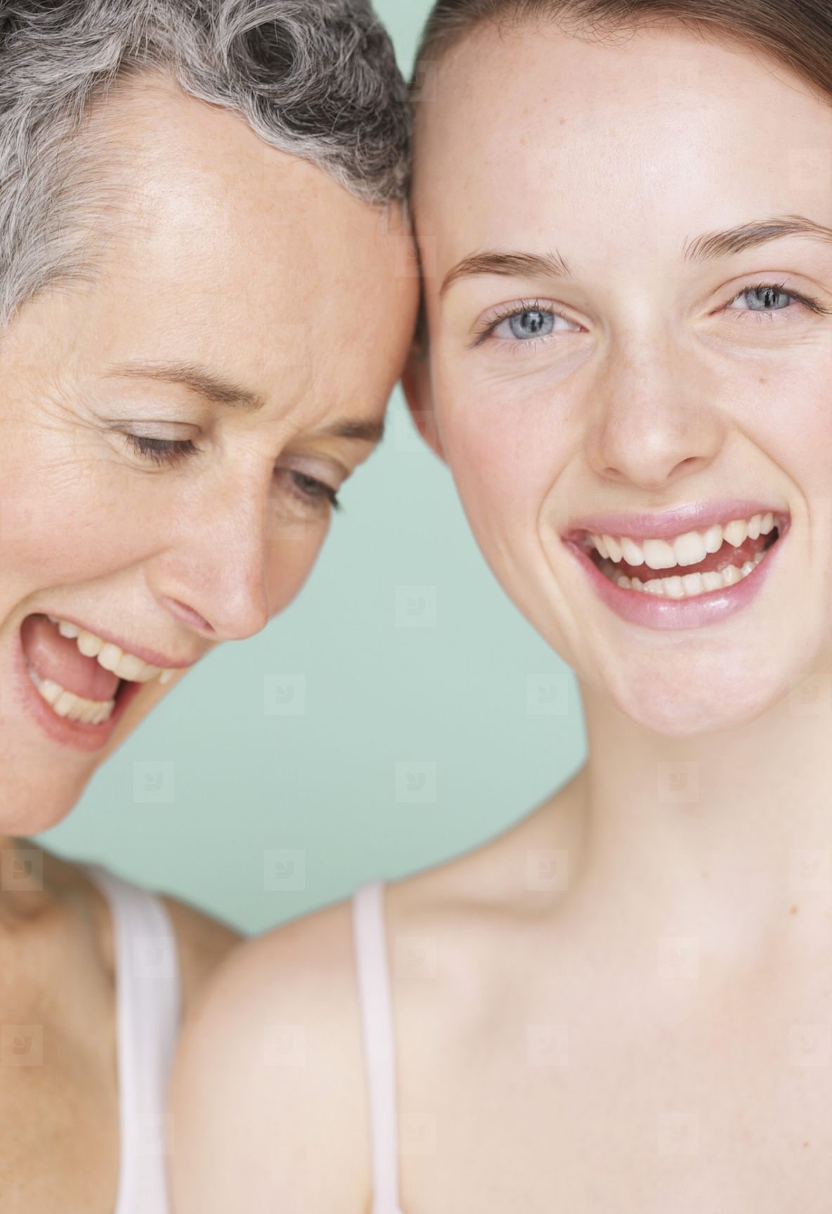 Smiling Mother and Daughter