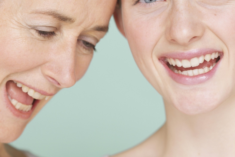 Smiling Mother and Daughter