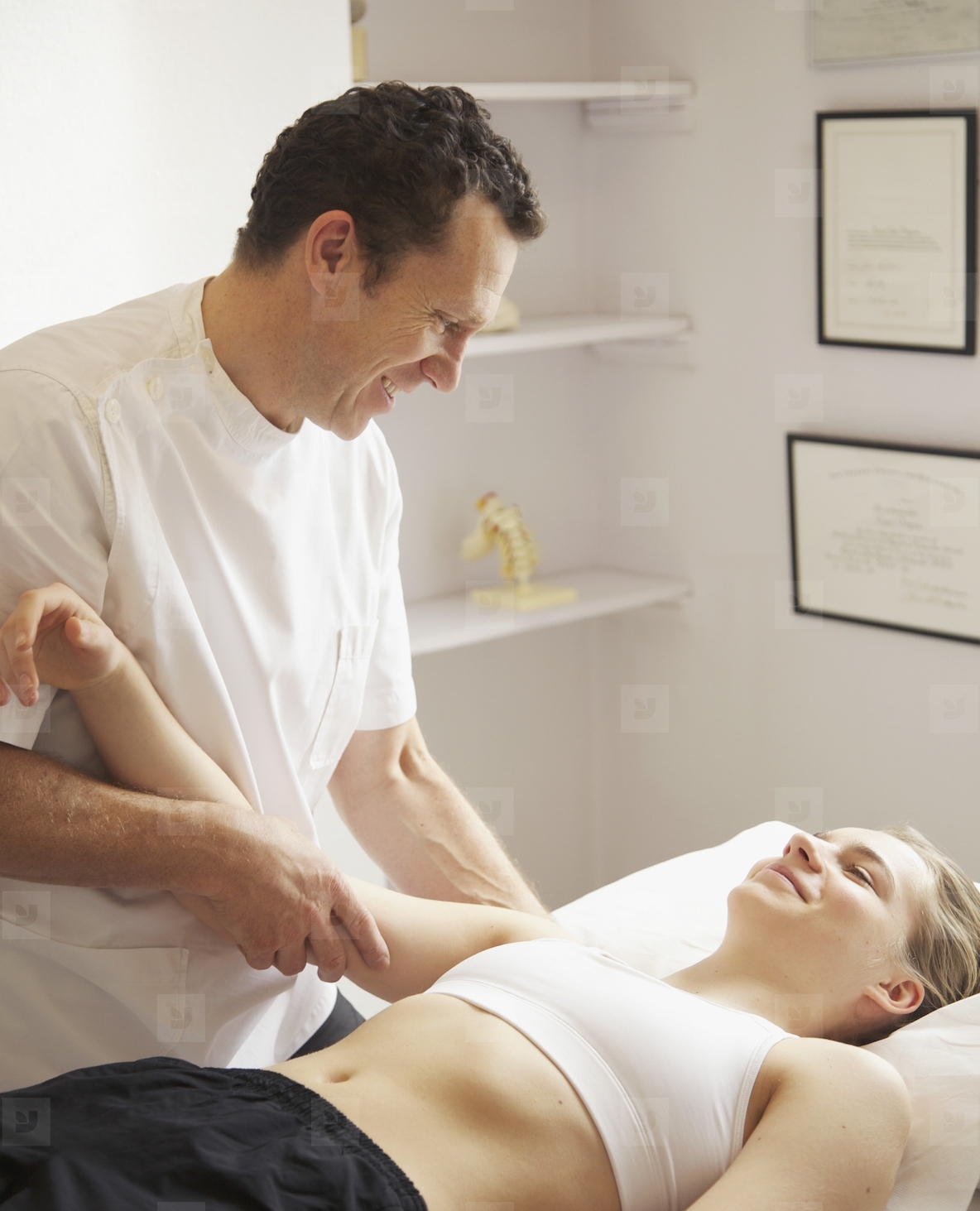 Osteopath Treating Female Patient