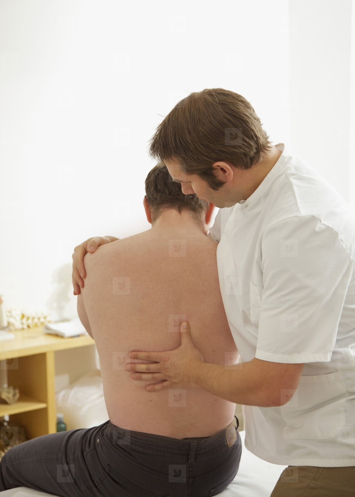 Osteopath Treating Male Patient