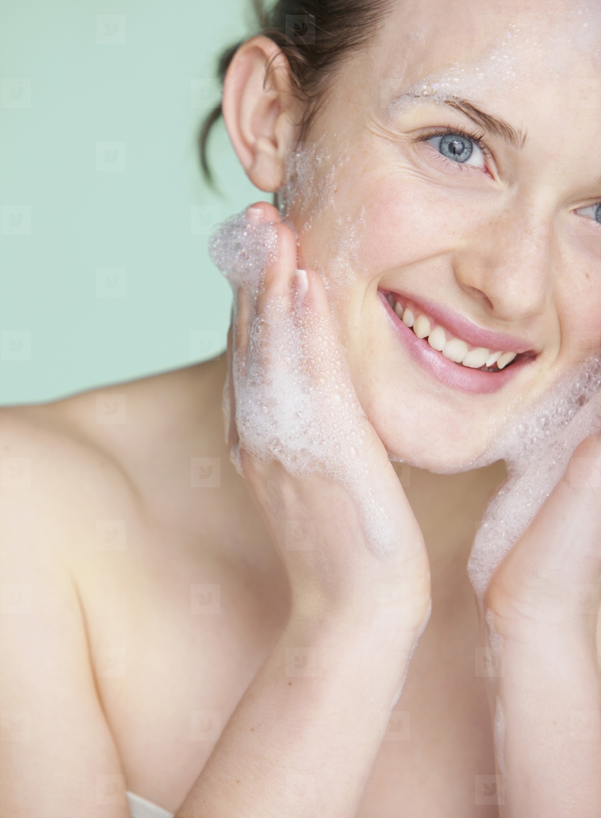 Young Woman Washing Face