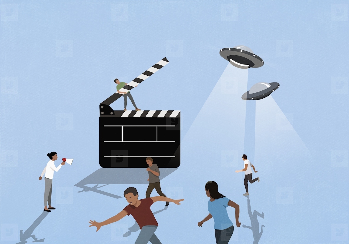 Director guiding actors running from UFO on movie set