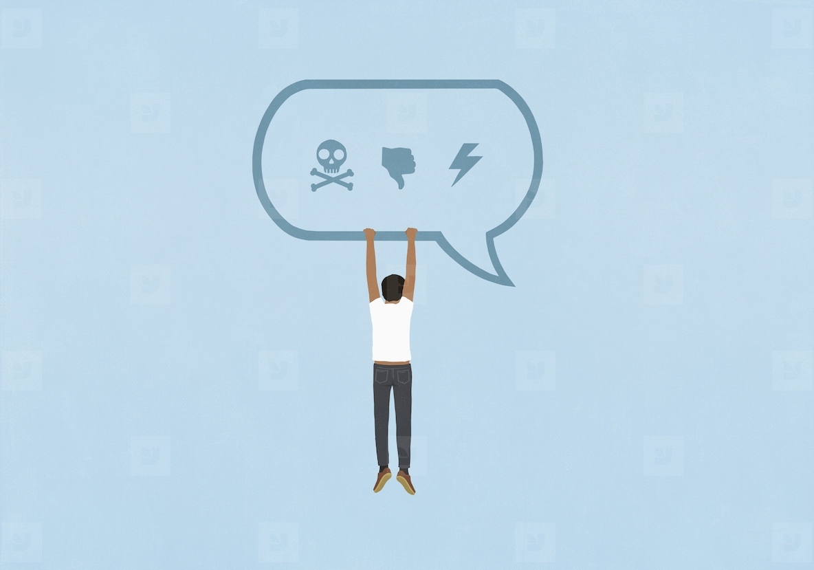 Man hanging from text message speech bubble with negative icons