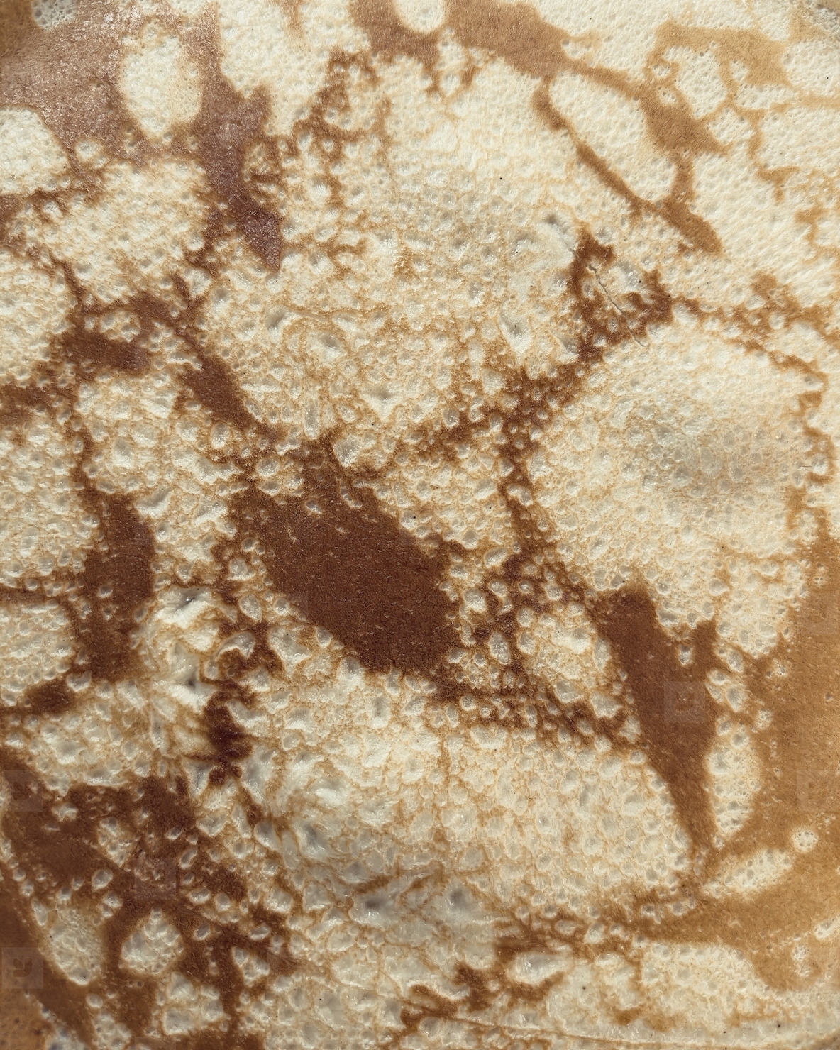 Full frame extreme close up of a pancake surface