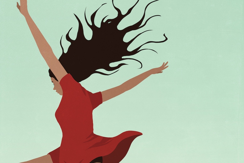 Low angle view carefree teenage girl jumping for joy on green background