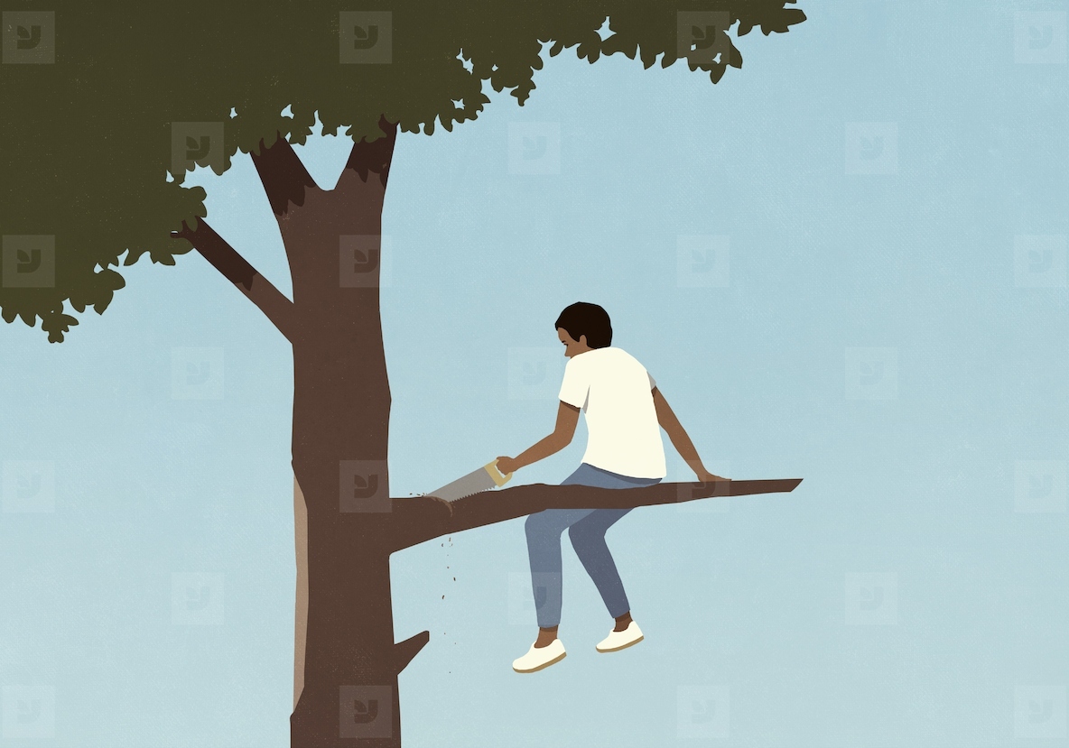 Teenage boy with saw cutting tree branch he is sitting on