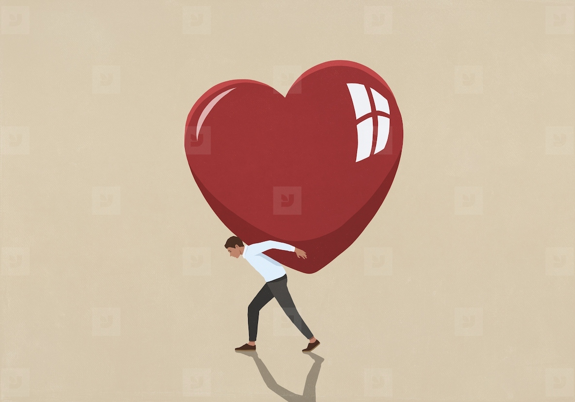 Man carrying large red heart on back