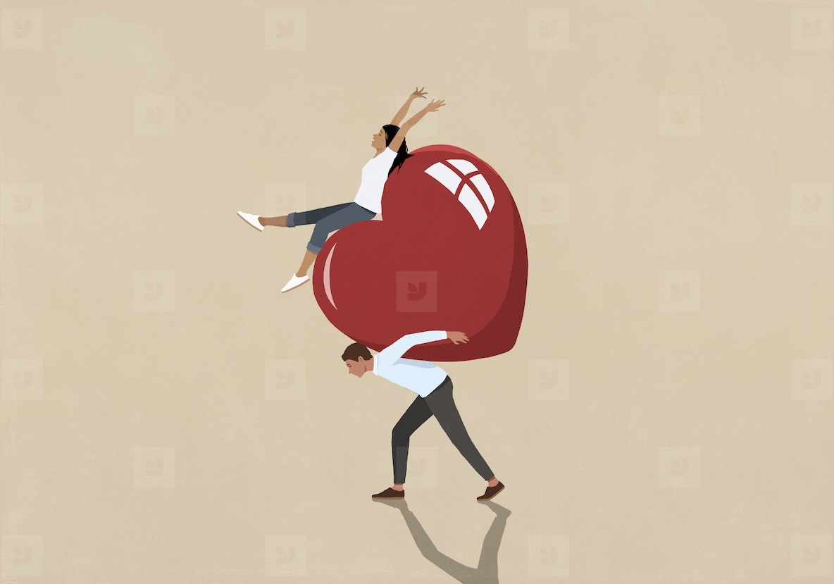Carefree woman on large red heart being carried on man s back