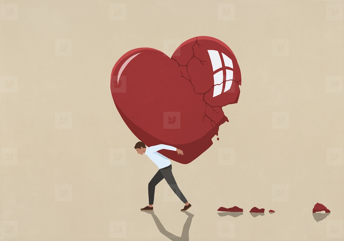 Man carrying large broken heart on back