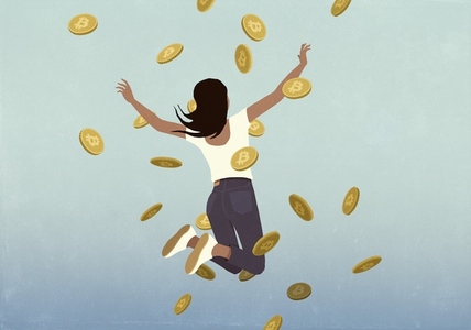 Carefree happy woman jumping for joy among falling Bitcoins